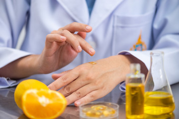 the scientist,doctor, make alternative herb medicine with herbal the organic natural in the laboratory. oil capsule, natural organic skincare and cosmetic