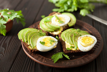 avocado. sandwich with avocado and egg. breakfast. healthy food.