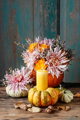 Bouquet of flowers in pumpkin.