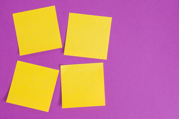 Four yellow stickers on a purple background. Mockup