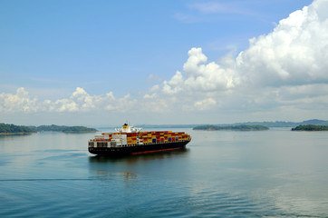 Cargo container ship transiting through Panama Canal.