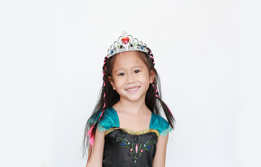 Portrait of happy little Asian girl dressed with a fantasy outfit on white background.