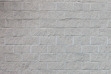 Section of rough textured block wall background