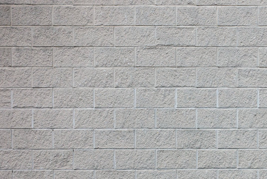 Section of rough textured block wall background