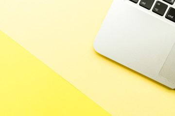 Mockup Blank page with laptop on yellow background. Top view with copy space for input the text....
