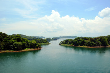 Fototapeta na wymiar Landscapes of the Panama canal, view from the transiting cargo ship.