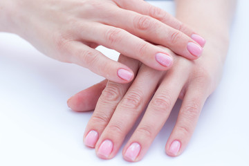 beautiful soft hands of a woman and handcream skincare
