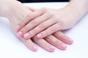 beautiful soft hands of a woman and handcream skincare