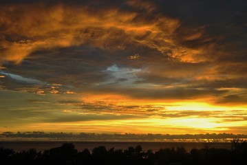 Breathtaking showcase of clouds and skies on fire at sunset 