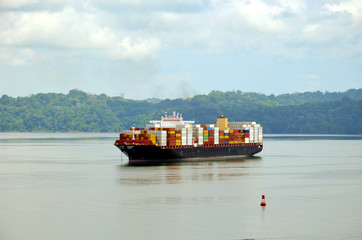 Cargo container ship transiting through Panama Canal.