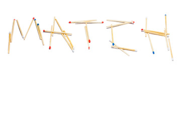 The word Match laid out from multi colored head matches on a white isolated background. Lettering made of bright colorful matchsticks. Concept and symbol of flammable danger and fire.