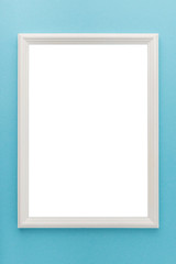 Vertical orientation mocap with white wooden frame on a blue background.