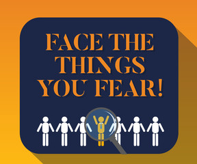 Handwriting text writing Face The Things You Fear. Concept meaning Have courage to confront scary situations Magnifying Glass Over Chosen Man Figure Among the Hu analysis Dummies Line Up