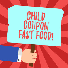 Handwriting text Child Coupon Fast Food. Concept meaning Ticket discount savings junk meals for kids Hu analysis Hand Holding Blank Colored Placard with Stick photo Text Space