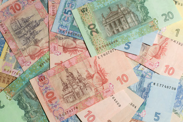 Ukrainian money. Hryvnia paper bill. Small paper notes. Cash. Background texture.