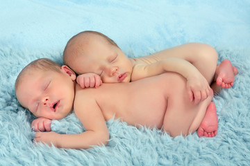 Newborn twin babies together