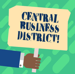 Handwriting text Central Business District. Concept meaning commercial and business center of a city Hu analysis Hand Holding Blank Colored Placard with Stick photo Text Space