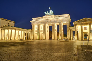 The famous Brandenburger Tor in Berlin illuminated at dawn