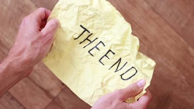 Rumpled colorful sheet with "The end" inscription