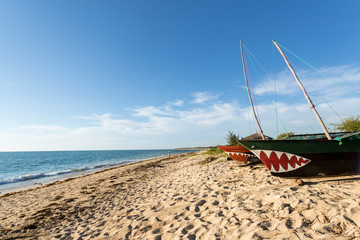 Traditional wooden fishing boats on the tropical beach of Anakao, Tulear, Madagascar.  Ocean view...