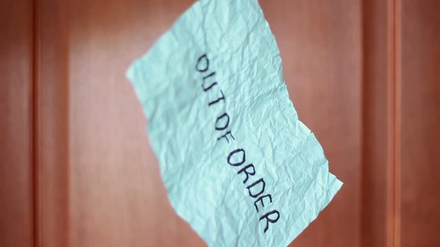 Suspended sheet with "Out of order" inscription