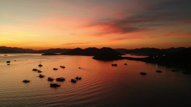 drone image from the bay in Coron, Palawan, Philippines with the most beautiful sunset ever