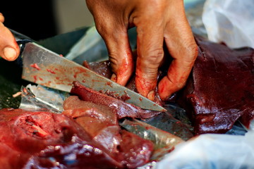 People are using raw pork slicing knives.