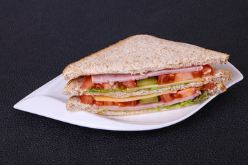 Club sandwich with ham and cheese
