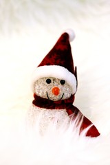 Snowman Christmas decoration on white blur background