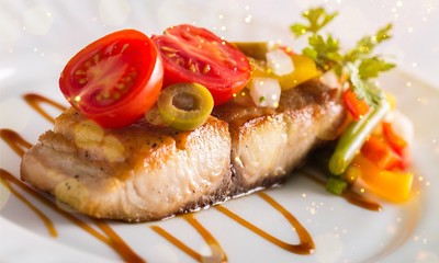 Tasty salmon on plate isolated