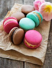 Colorful macaroons and tulips