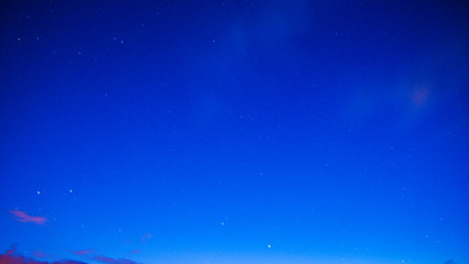 night sky with stars and clouds