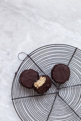 Biscuits on white marble background with copy space