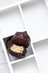 Biscuits on white marble background with copy space