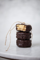 Biscuits on white marble background with copy space
