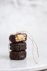 Biscuits on white marble background with copy space