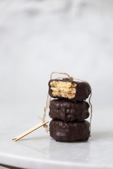 Biscuits on white marble background with copy space