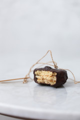 Biscuits on white marble background with copy space