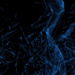Transparent blue plastic wrap on the black background. Plastic shopping bag texture. Reusable trash and waste.