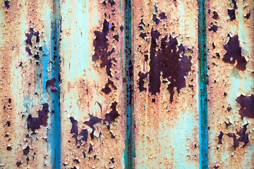 Iron surface is covered with old paint, texture background.