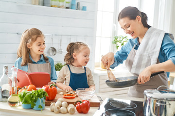 Happy family in the kitchen.