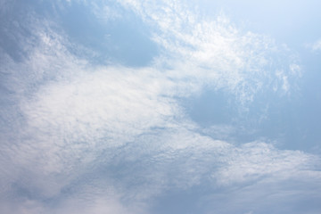 Naklejka na ściany i meble Blue sky with white clouds on sunny sky background
