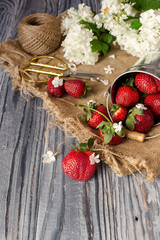 Strawberries on a wooden table close-up