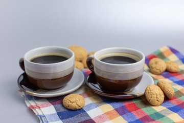 Cookie and two cups of coffee. Kruidnoten, pepernoten, strooigoed