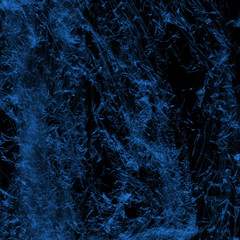  Transparent blue plastic wrap on the black background. Plastic shopping bag texture. Reusable trash and waste.