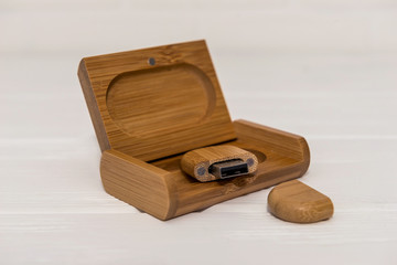Wooden usb mass storage device on light background