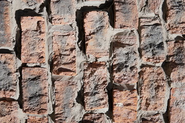 brick wall of red color, wide panorama of masonry