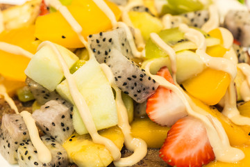colorful fresh fruit salad plate closeup