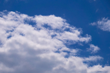 Blue sky with clouds in summer sunny day