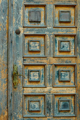 vintage wooden door and old white wall as background